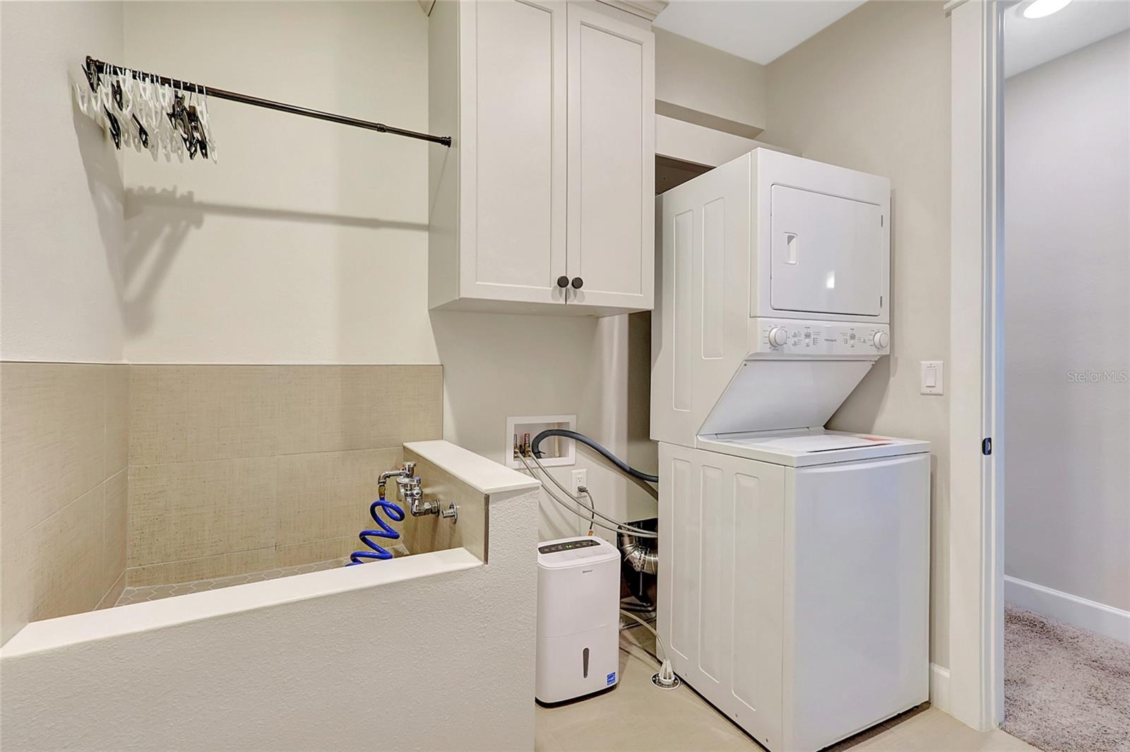 Standard side by side or stack washer dryer and luxurious dog wash,