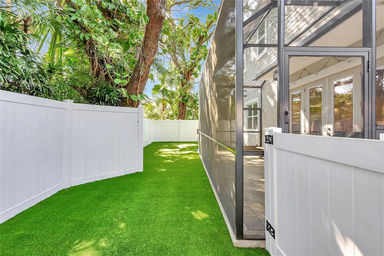 Wall of Greenery over the PVC Fence affords serene privacy