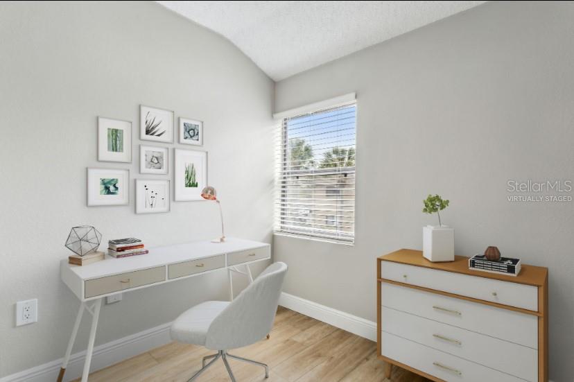 Virtually staged flex room to use according to your lifestyle.Right off of the living area. An office if you work from home! A workout space. A craft room, reading room, or just use your imagination!