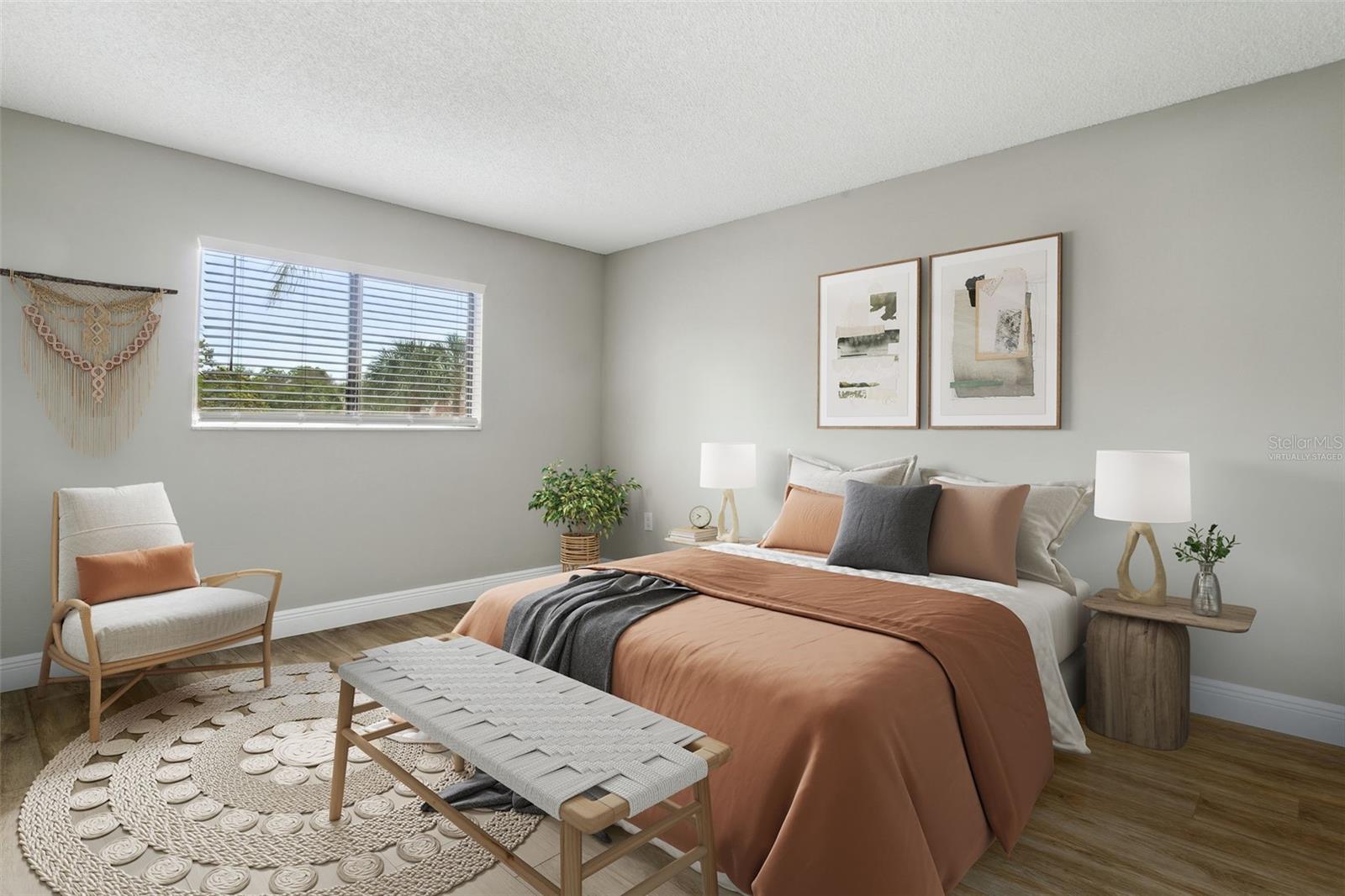 Virtually staged Primary bedroom is large and roomy with a double window to let in light. Yes a king bed could fit!The Primary has a large walk in closet and en-suite bathroom!