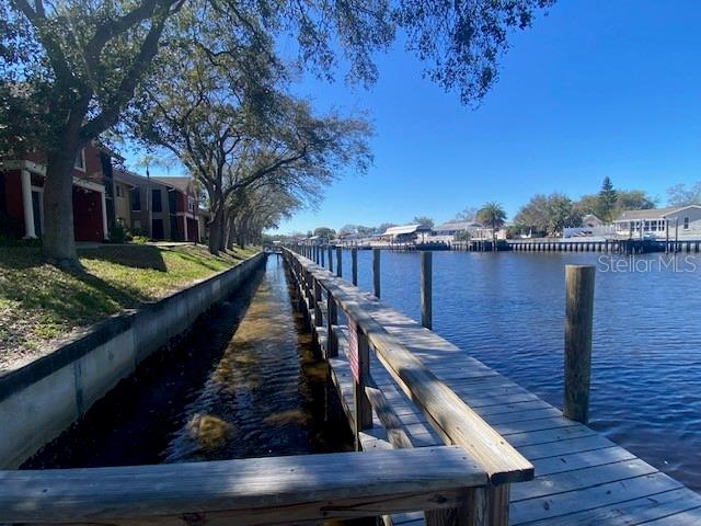 View from the Board walk/Dock directly behind your home. Take a peaceful stroll to relax. Enjoy a water view sunset. Boat slips are privately owned.