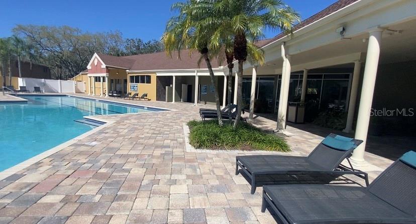Hang out at the clubhouse and pool on a beautiful Florida day.