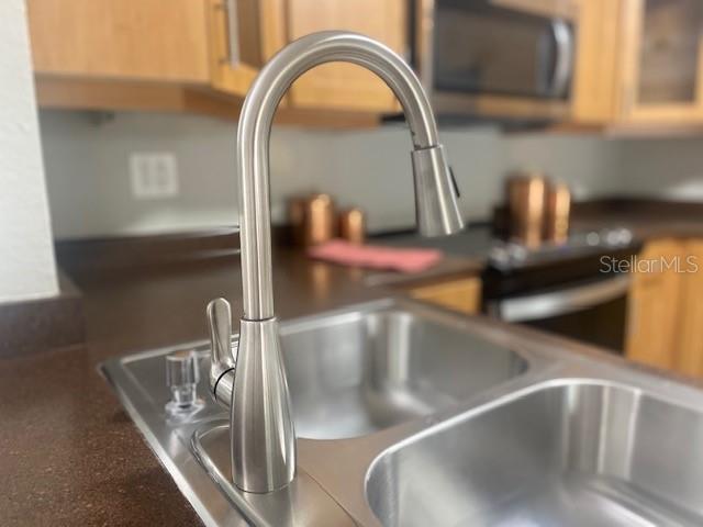 Sleek new faucet and double sink.