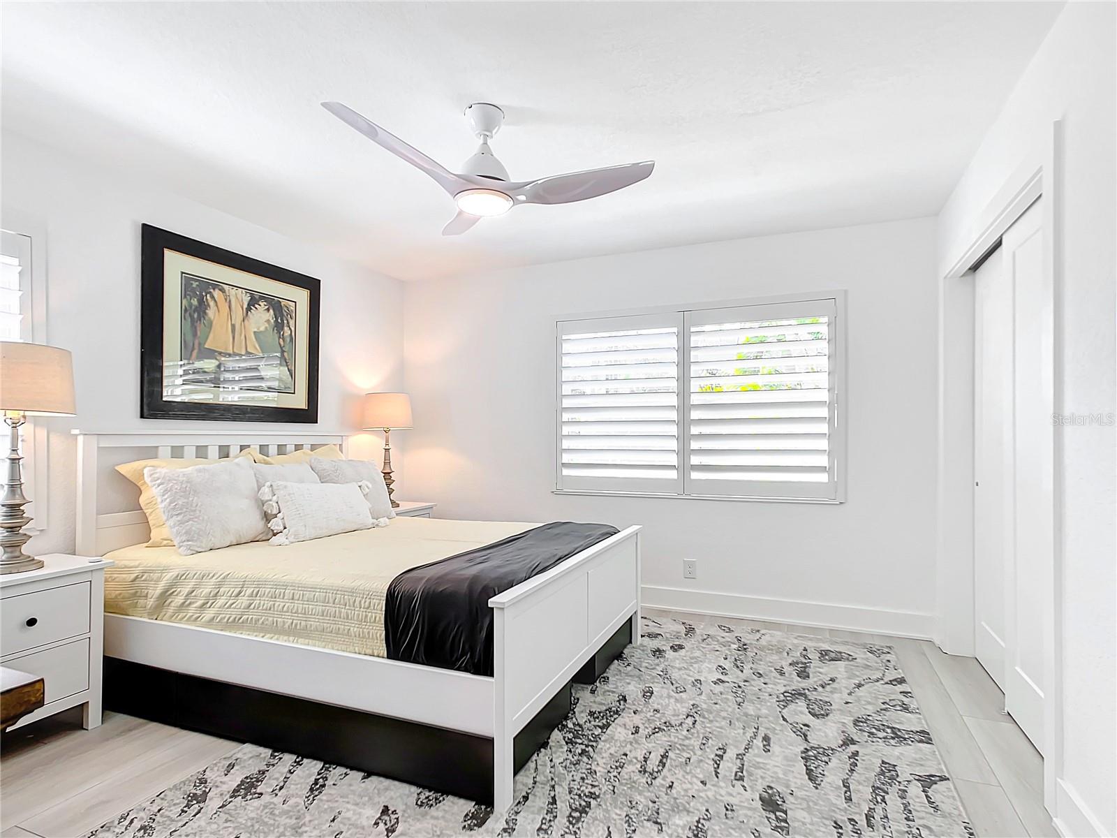 The 3rd bedroom, adorned with plantation shutters has a built-in closet with organizers.