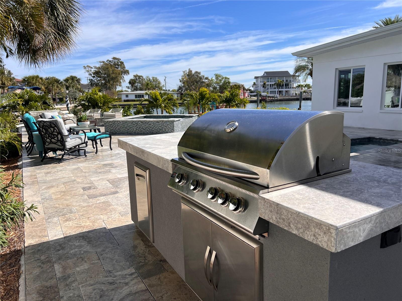 New BBQ grill and food prep island with solid surface countertop, make entertaining a breeze!