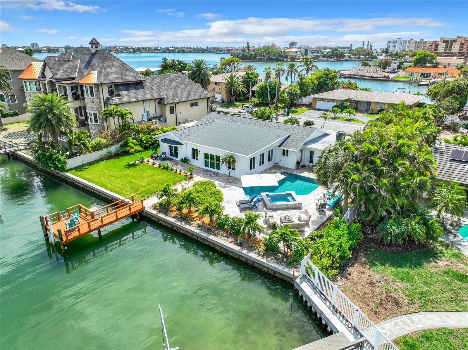 Aerial view of the stunning home and yard on the intracoastal