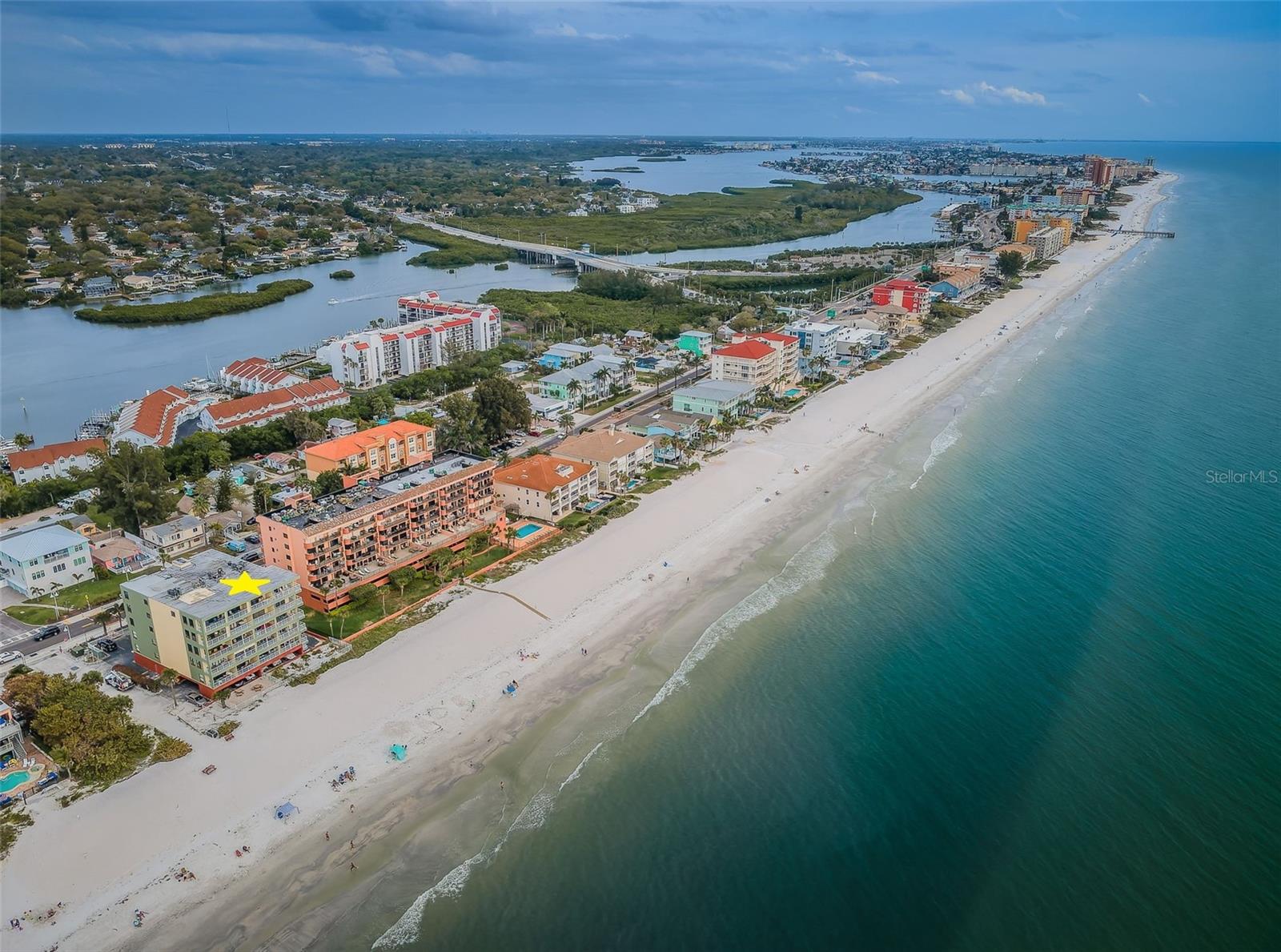 .. INDIAN SHORES LOOKING SOUTH.. CITY RUNS ABOUT 3 TO 4 MILES NORTH TO SOUTH.. ONLY TWO BLOCKS WIDE WHICH KEEPS THE BEACHES FREE OF CROWDS. NOT A LOT OF PARKING PARKING..EN JOY..LOCATED 22 MILES DUE WEST OF TAMPA AIRPORT.