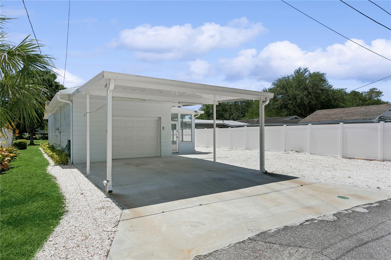 Carport/alley access and side yard