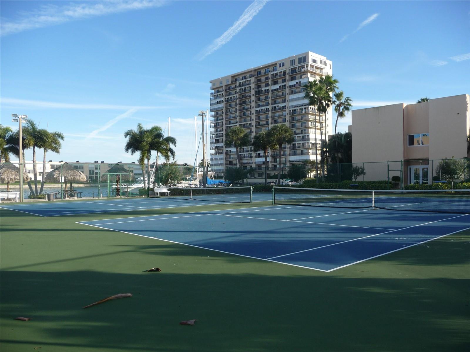 Tennis courts on property.
