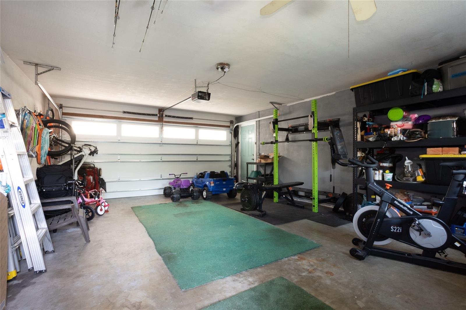 Oversized 2 car garage with access to the backyard