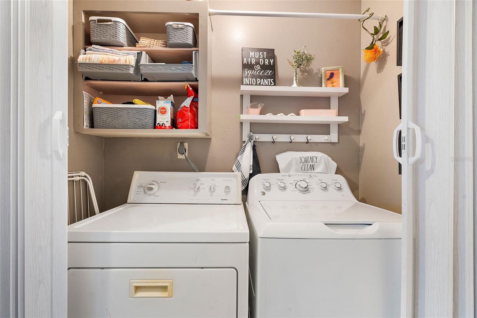 Laundry Closet with Shelves, Hanging Rod, and Hooks