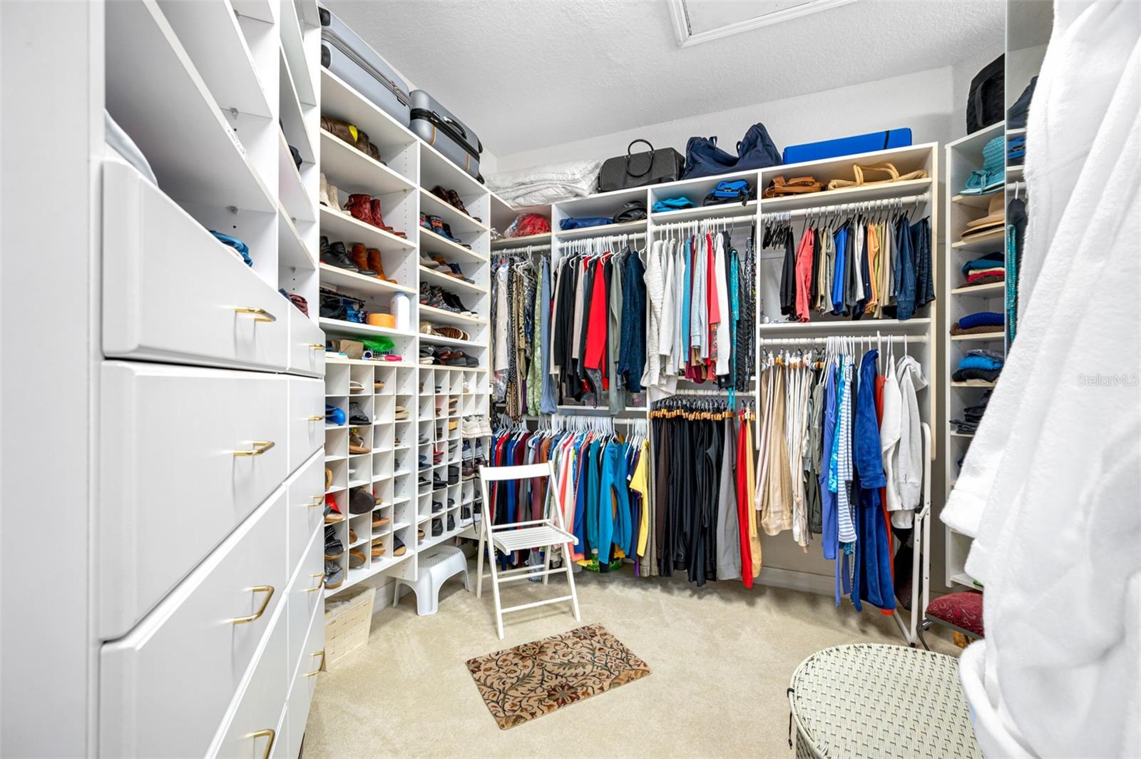 Expansive his-and-hers walk-in closets