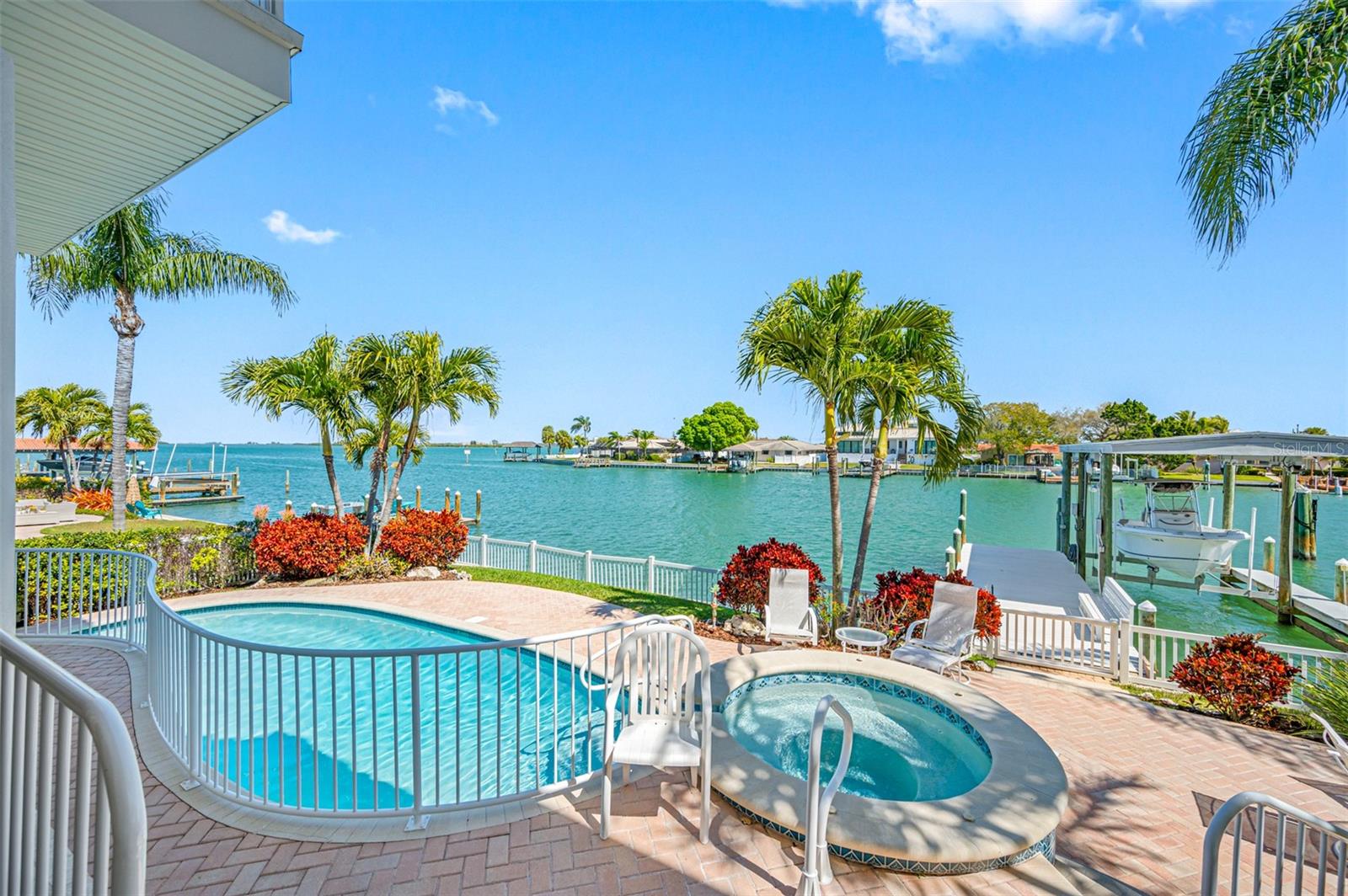 View from the lanai encompassing breath-taking views of Clearwater Harbor, the pool, spa, dock, and boathouse