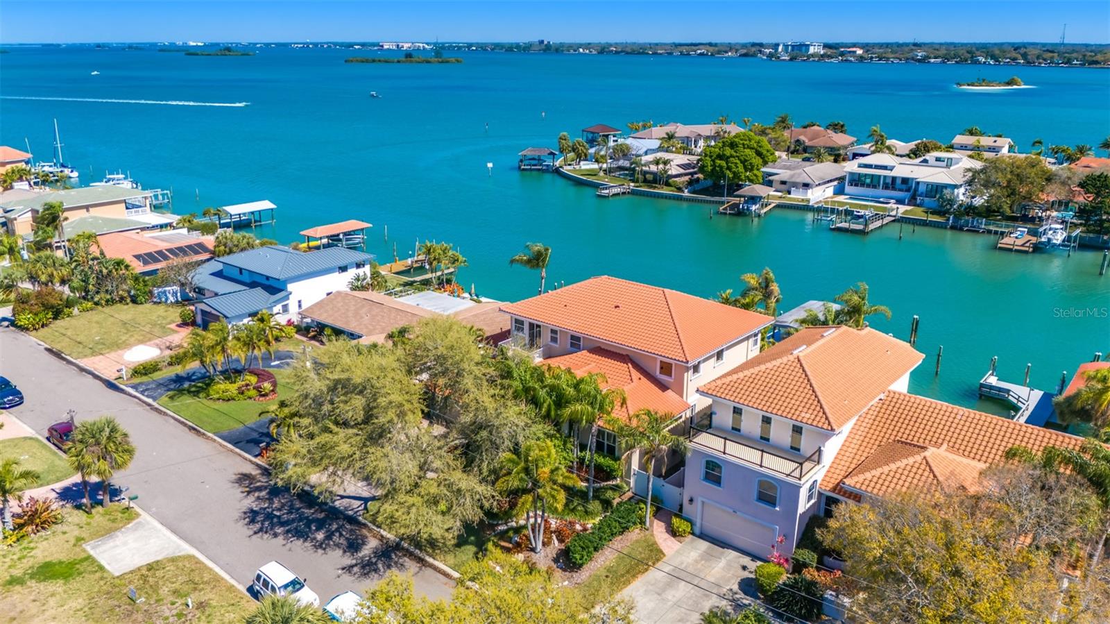 Aerial view of front of property facing NE showing proximity of open water views