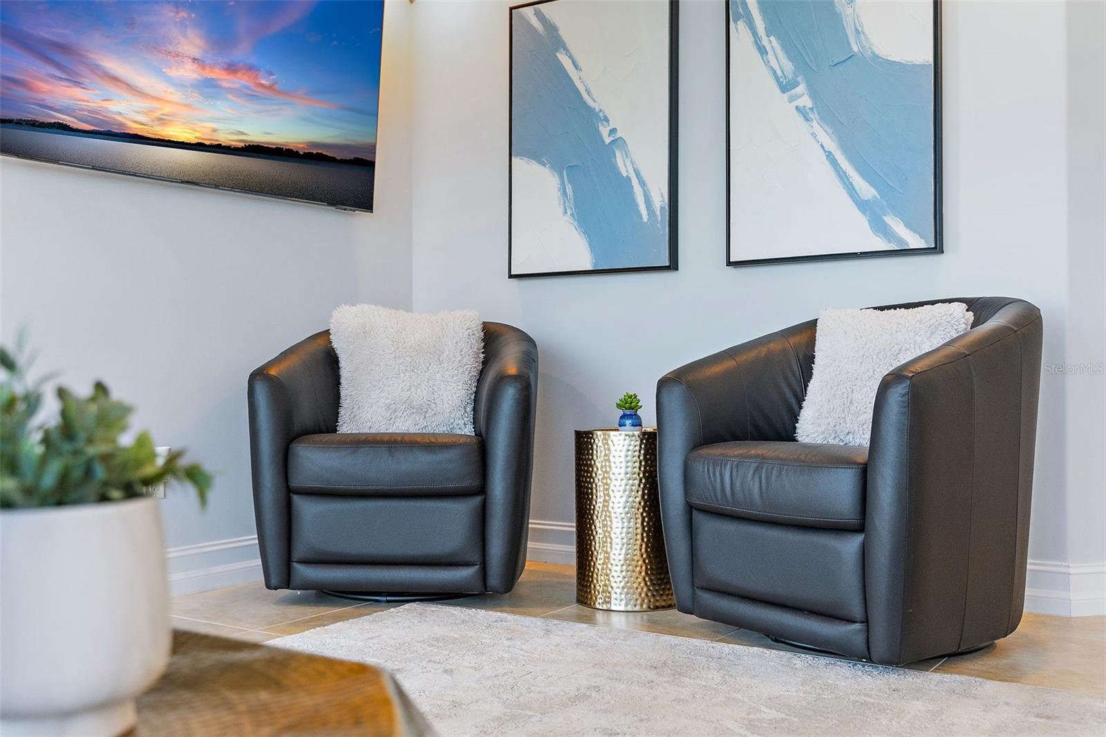 This corner of the living room area provides a cozy corner for chatting, enjoying a beverage and having a 1:1 with your bestie!
