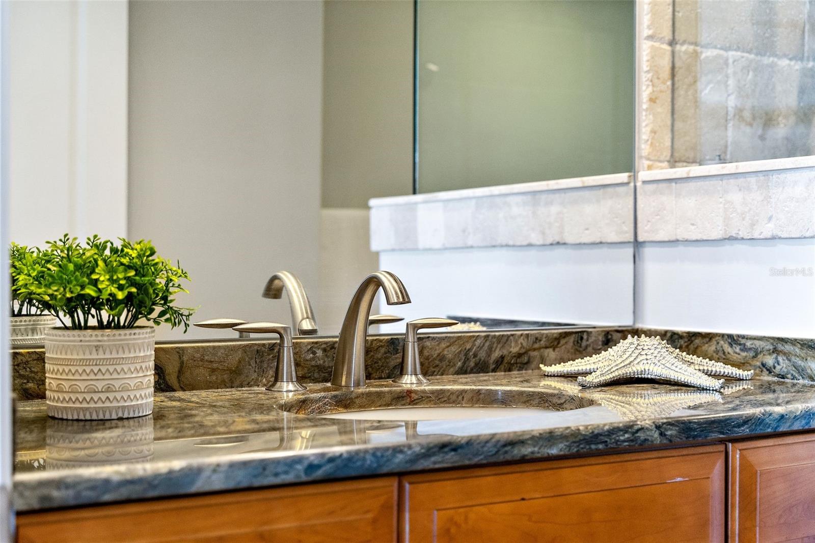 The 8" widespread faucet in a brushed finish and undermount sink are comfortable to use and stylish.