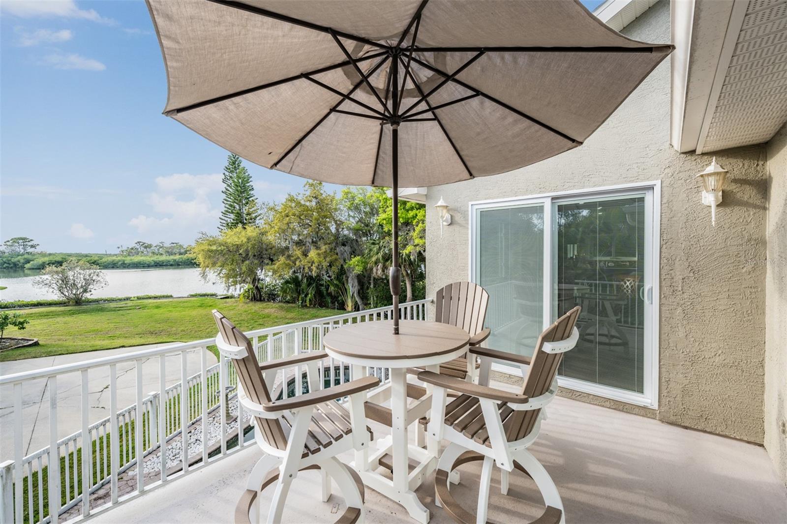 Balcony overlooking Oyster Bayou.  Enter into the dining room or kitchen.