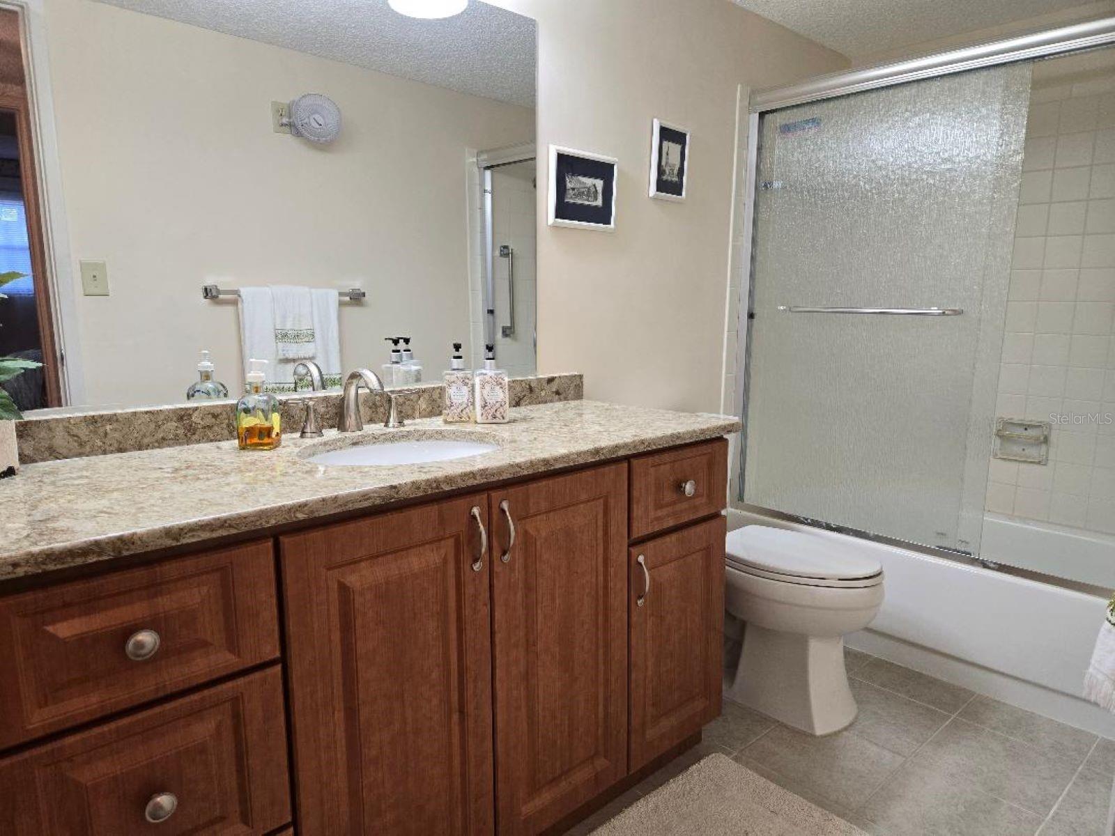 Bathroom #2 - Newer Vanity with updated sCounter and Sink.