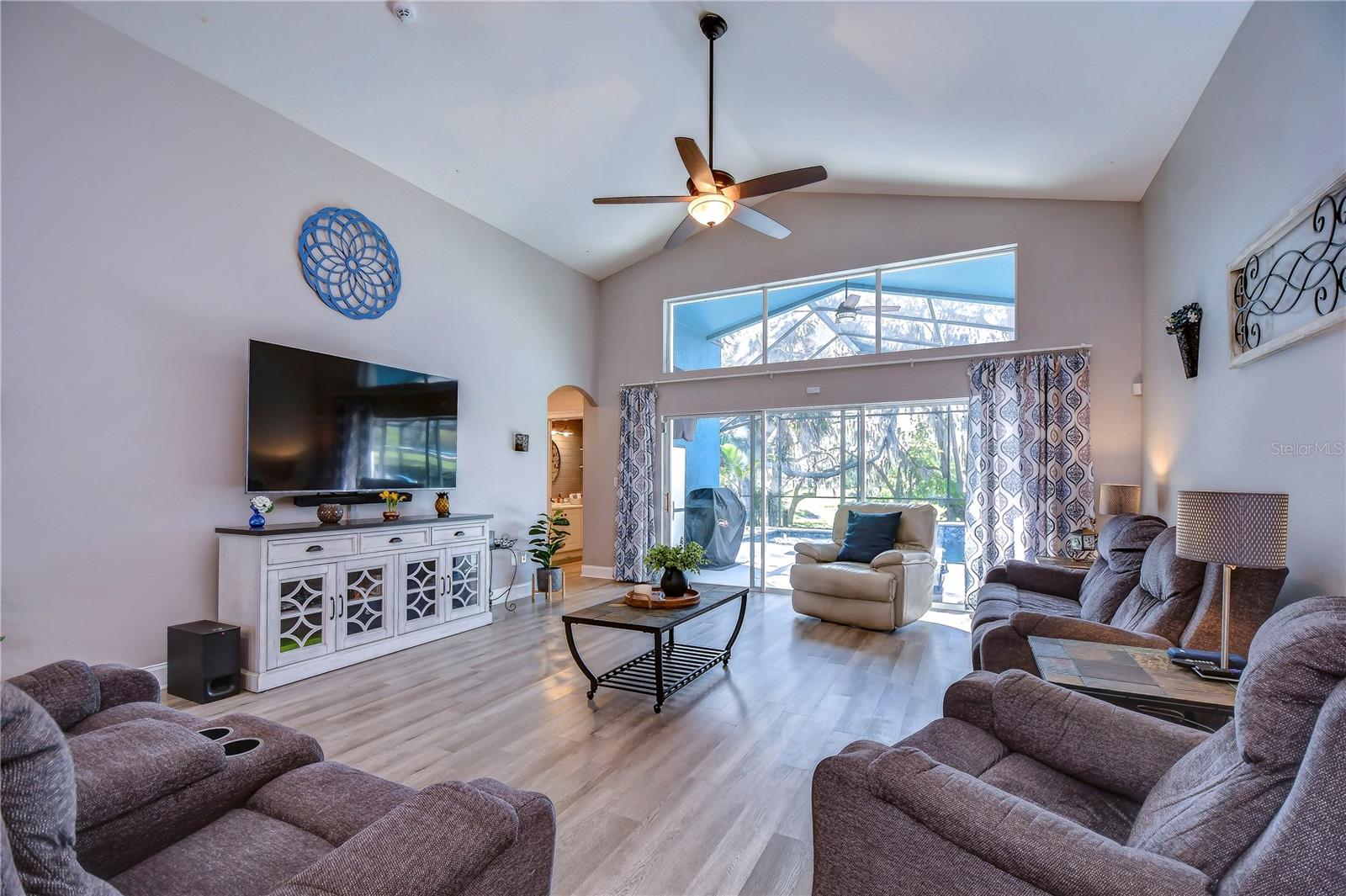Vaulted ceilings and a wall of sliders with large transom windows above giving you unbelievable views!