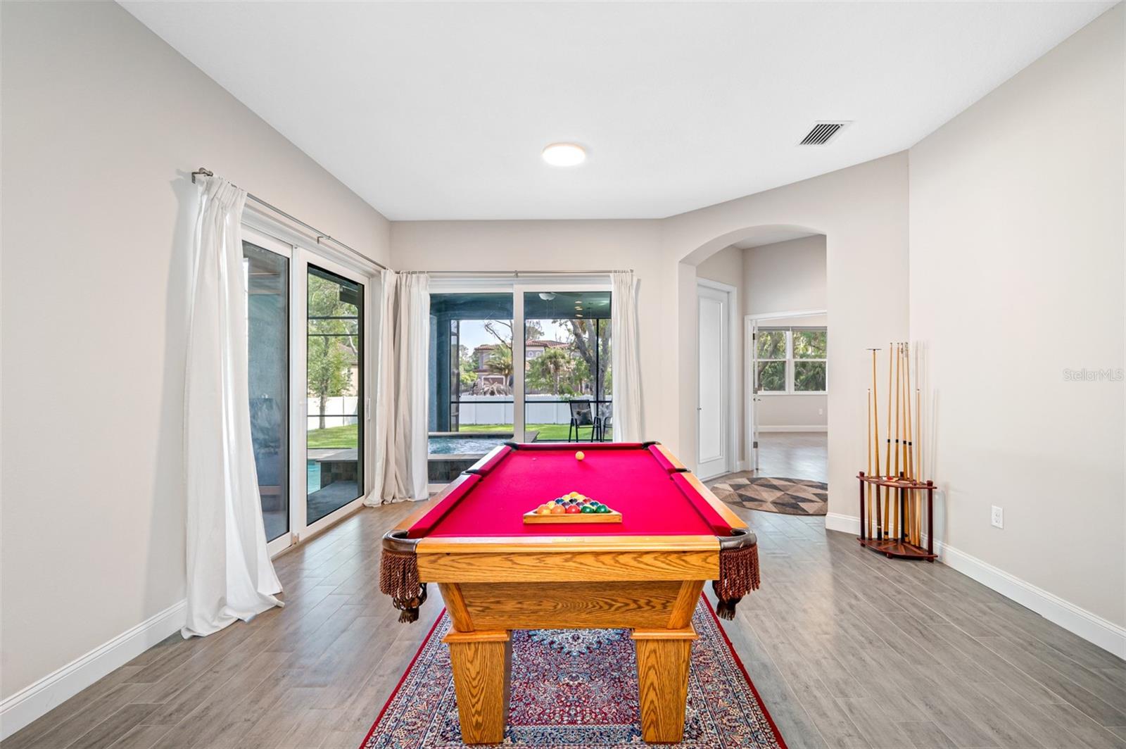 Dining area, currently used for pool table