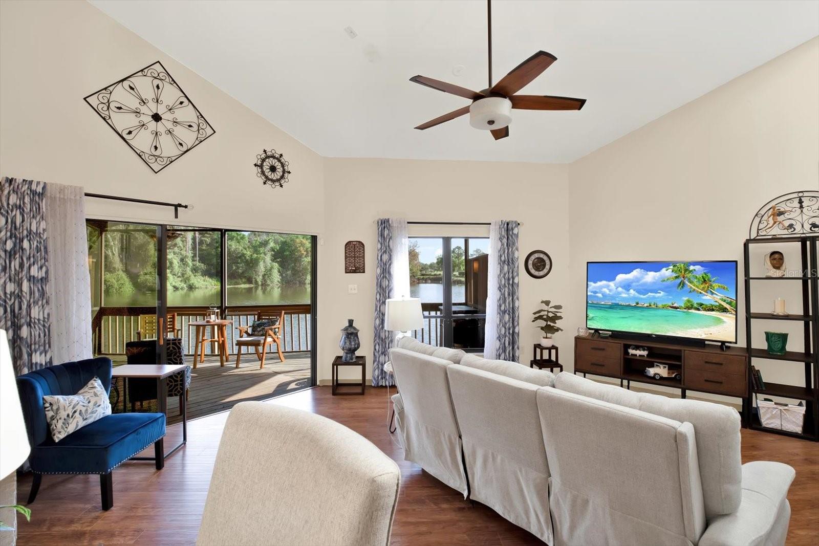 Vaulted Ceilings in living room and brings in plenty of natural light.