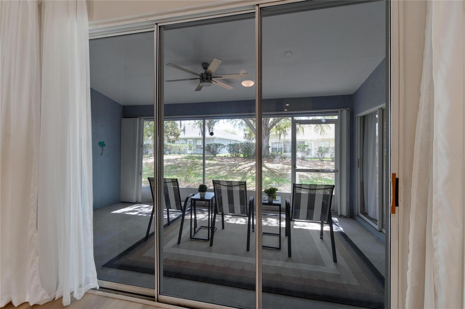 Wall of sliding glass doors leading directly to the spacious Lanai