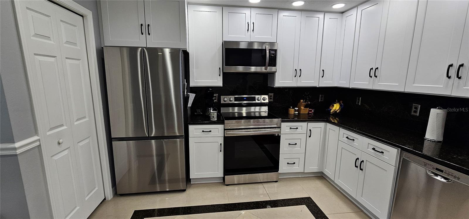 Your Beautifully updated kitchen with new stainless steel appliances