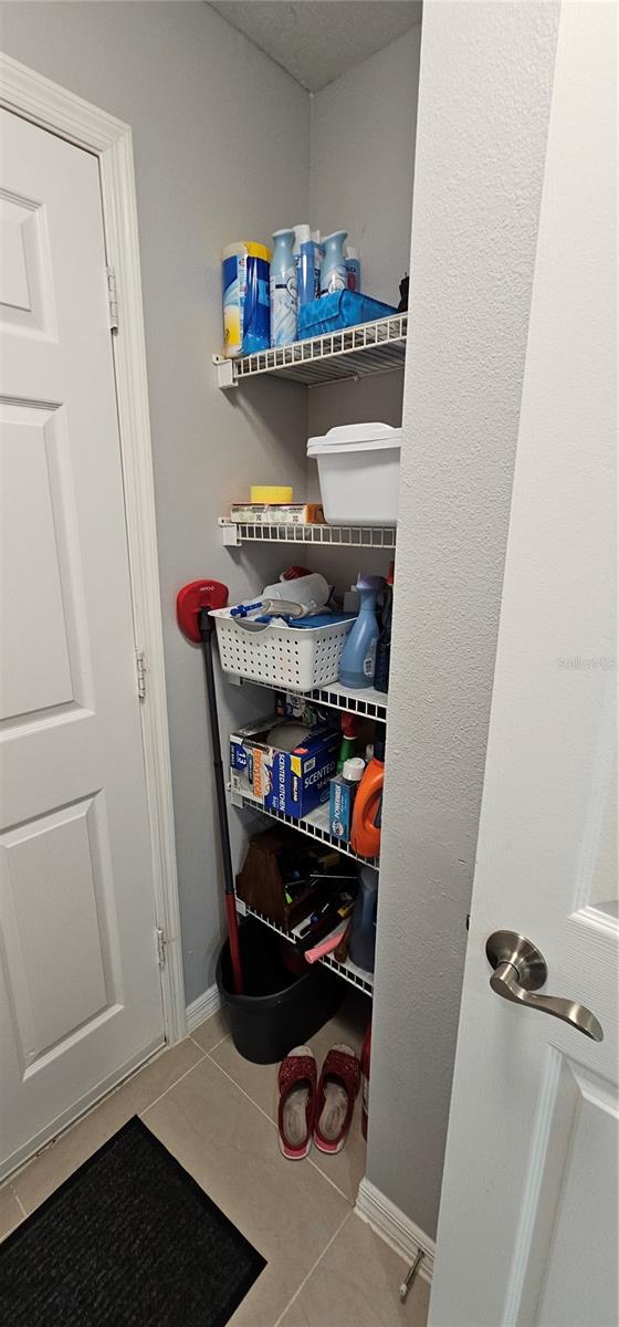Storage closet in utility room
