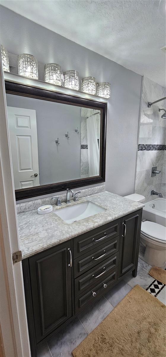 Bathroom with marble and granite