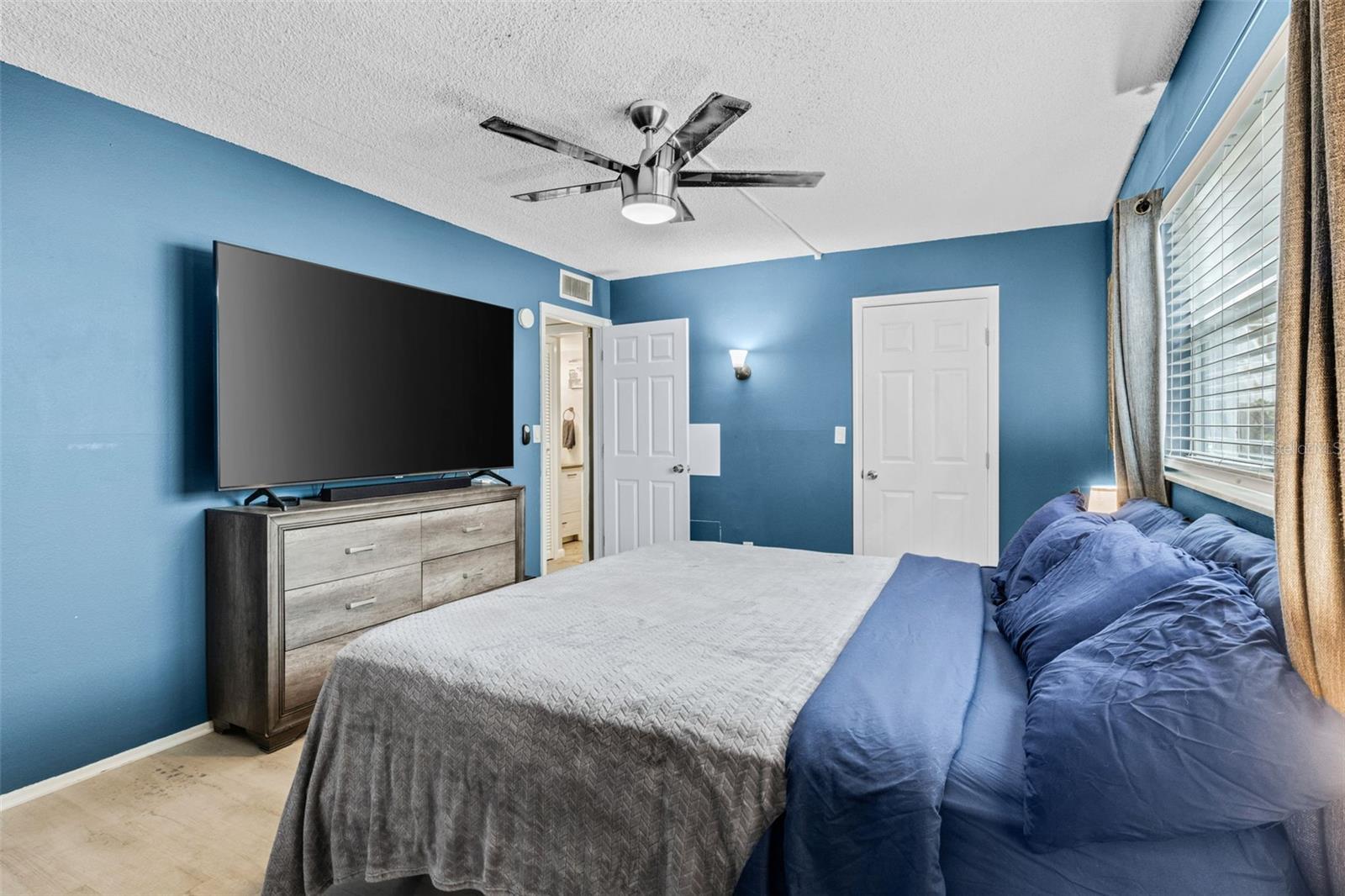 Bedroom with big screen TV