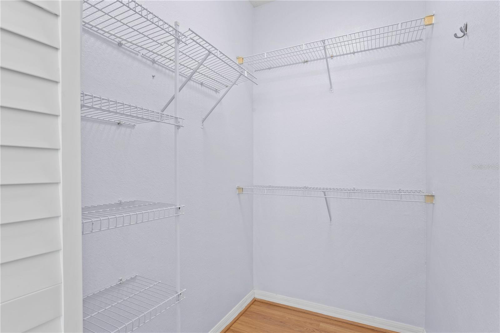 The bedroom is complete with a nice sized walk-in closet.