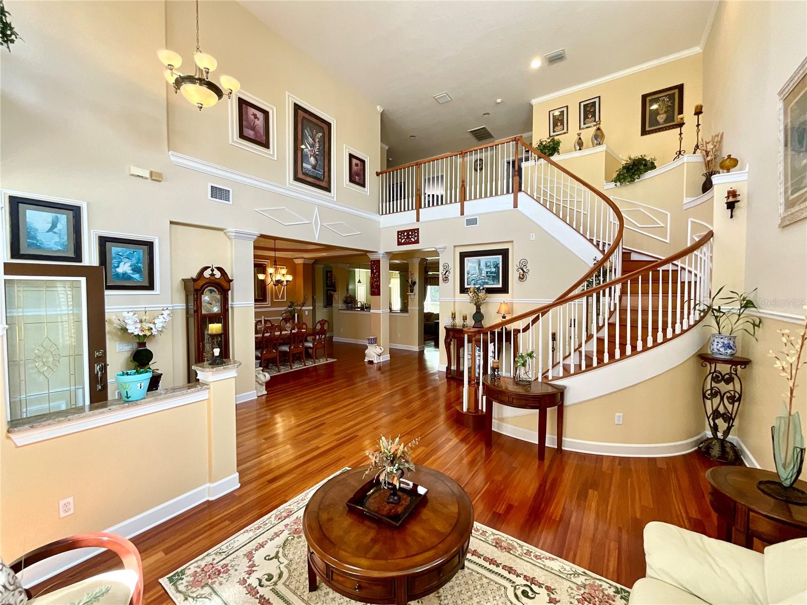 LIVING ROOM AND SPIRAL STAIRS