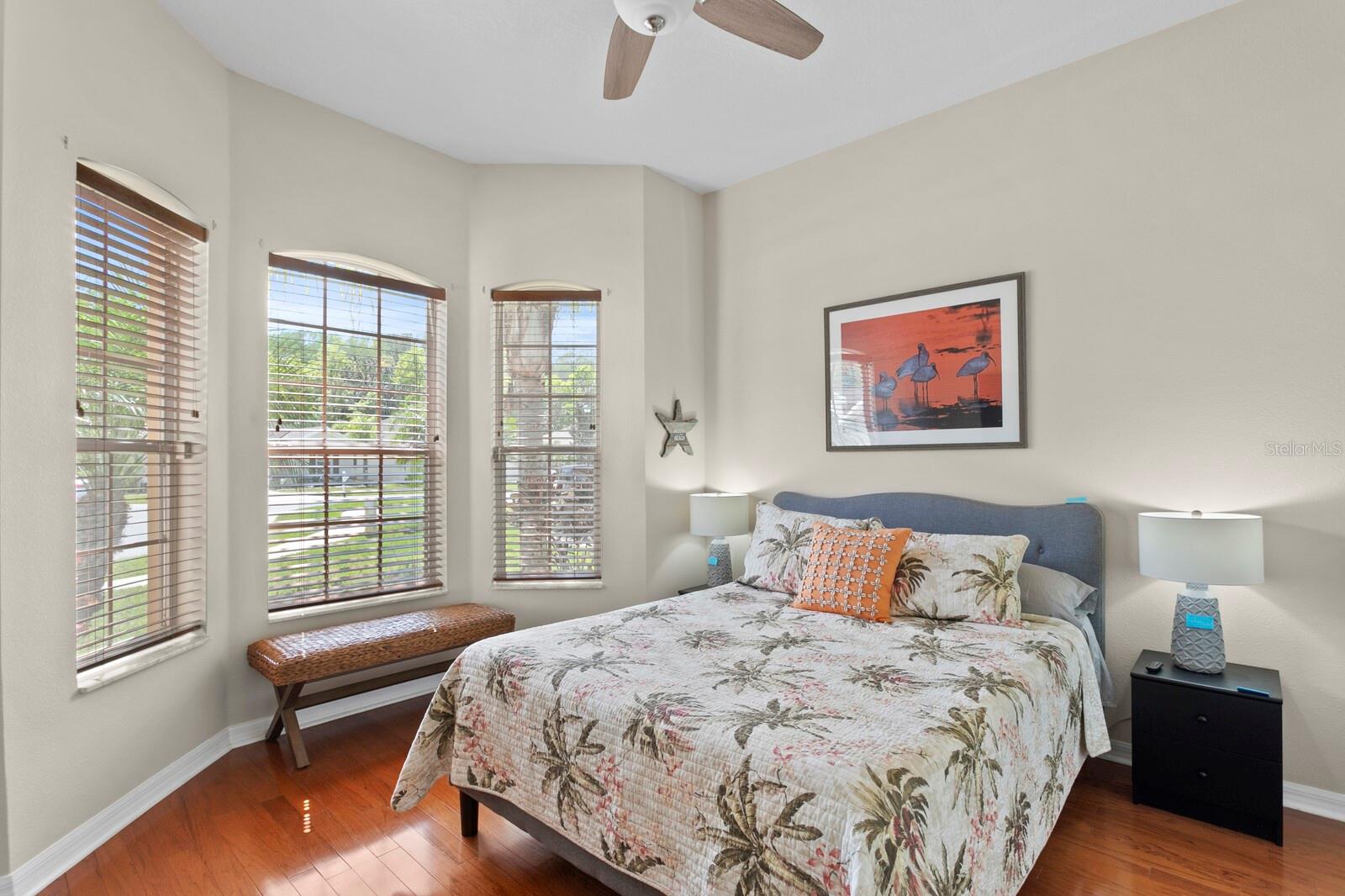 Guest Bedroom With Solid Wood Flooring