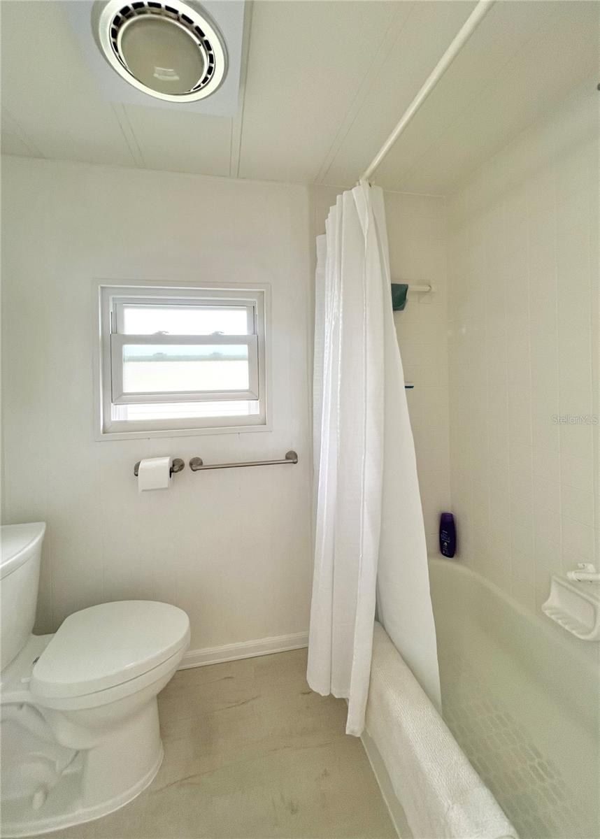 shared toilet and tub/shower combo