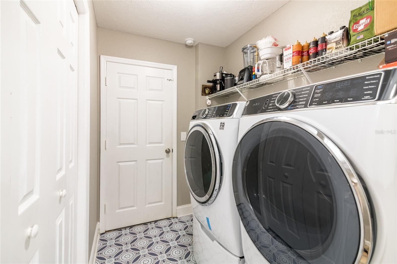Laundry room with lots of storage.