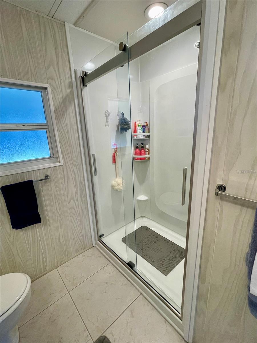 Hall bath - better picture of the newly added walk-in shower with glass doors