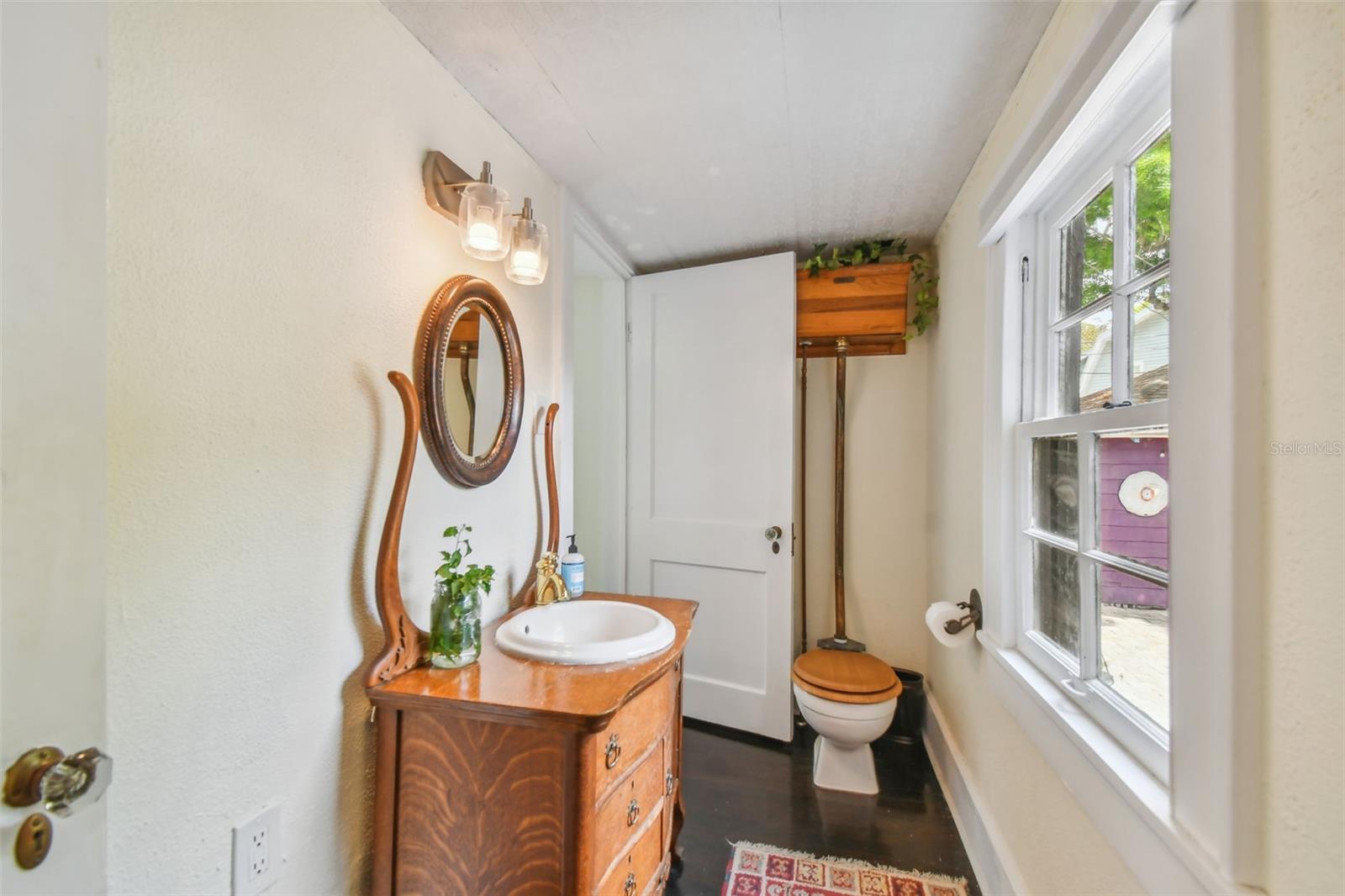 Powder Room with pull handle toilet