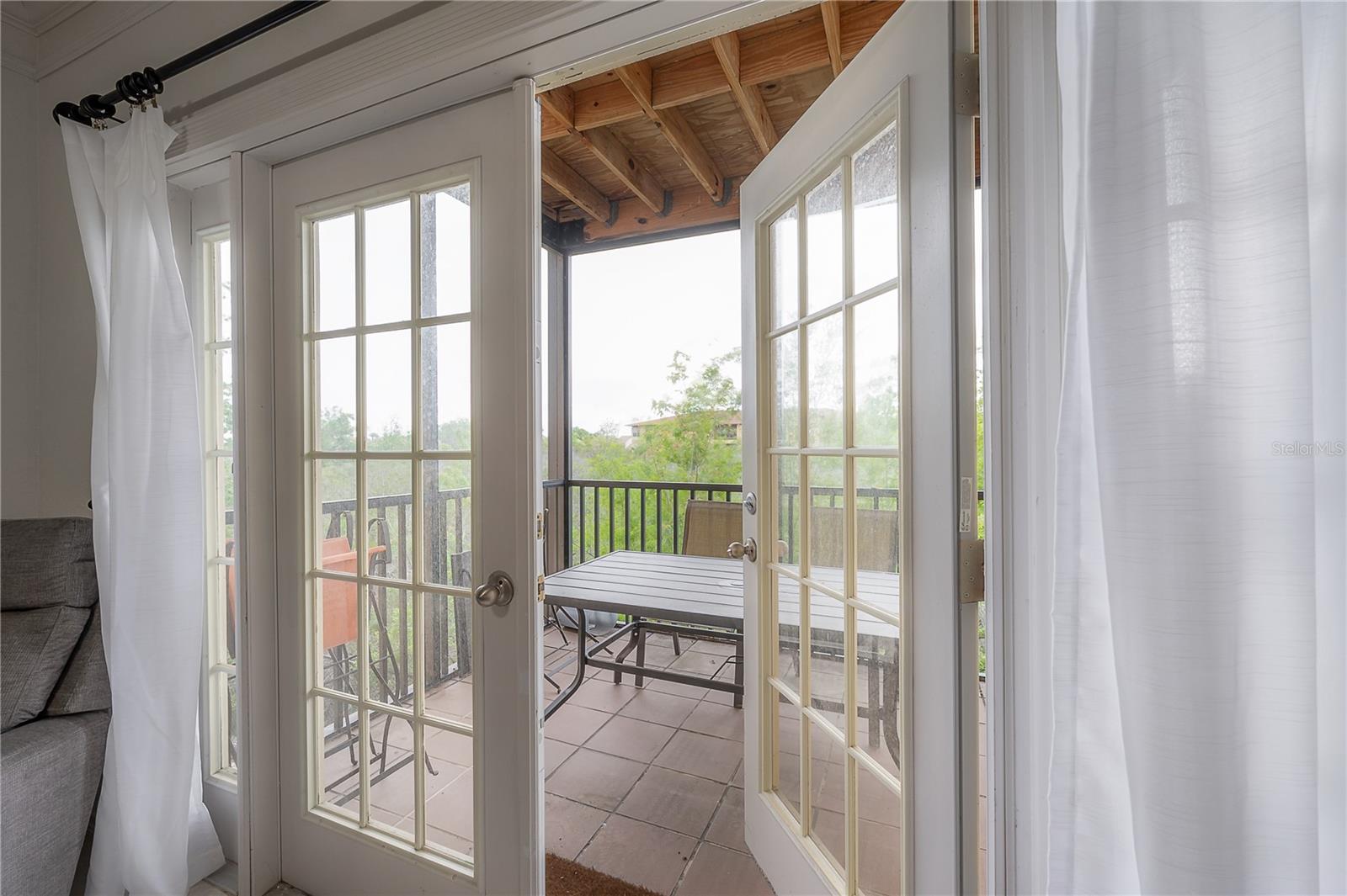 French doors opening to the balcony
