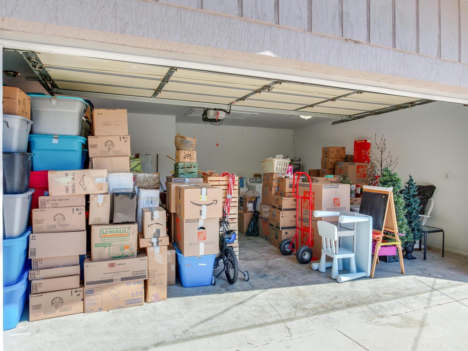 Garage with packing boxes.