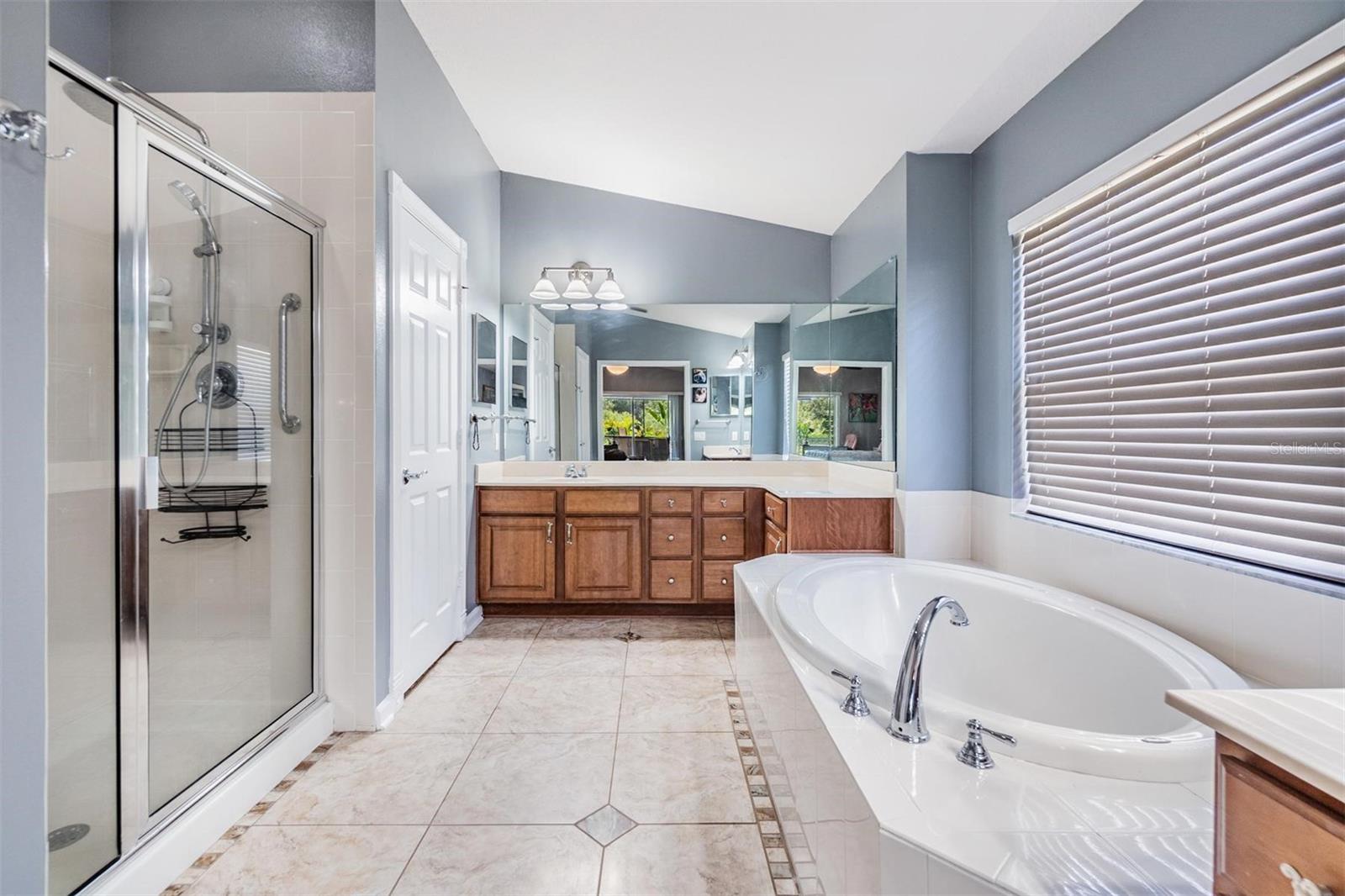 Master Bathroom with Double Vanities and Soaking Tub