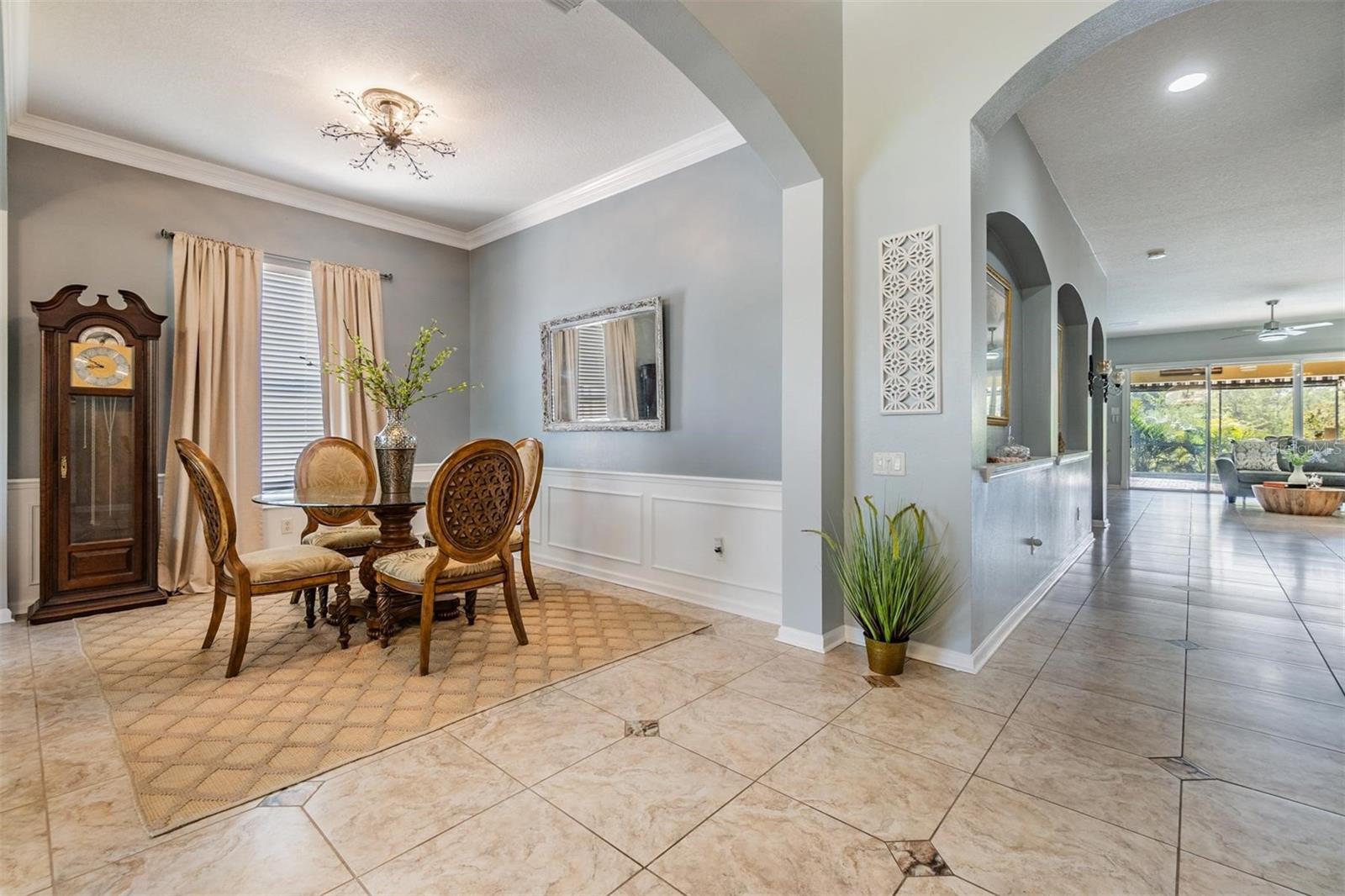 Formal Living Room, crown molding and tile flooring