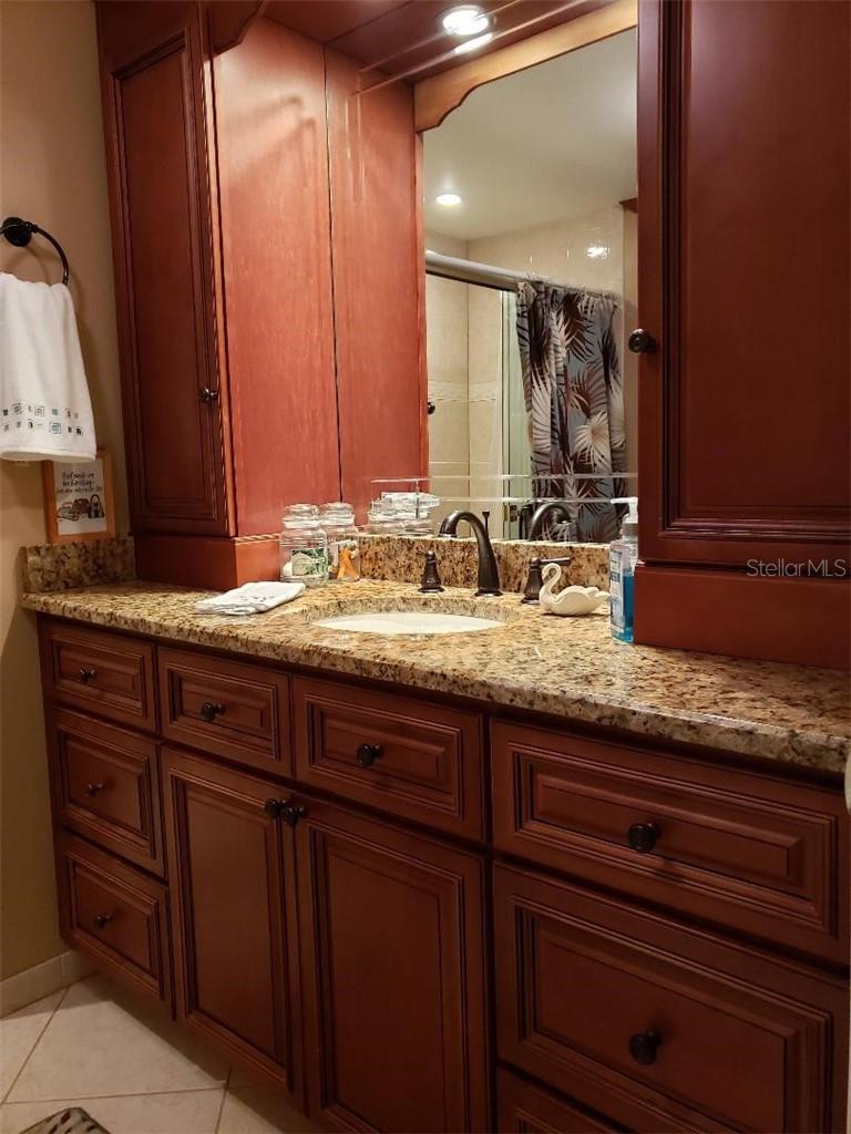 Hall bath with top cabinets