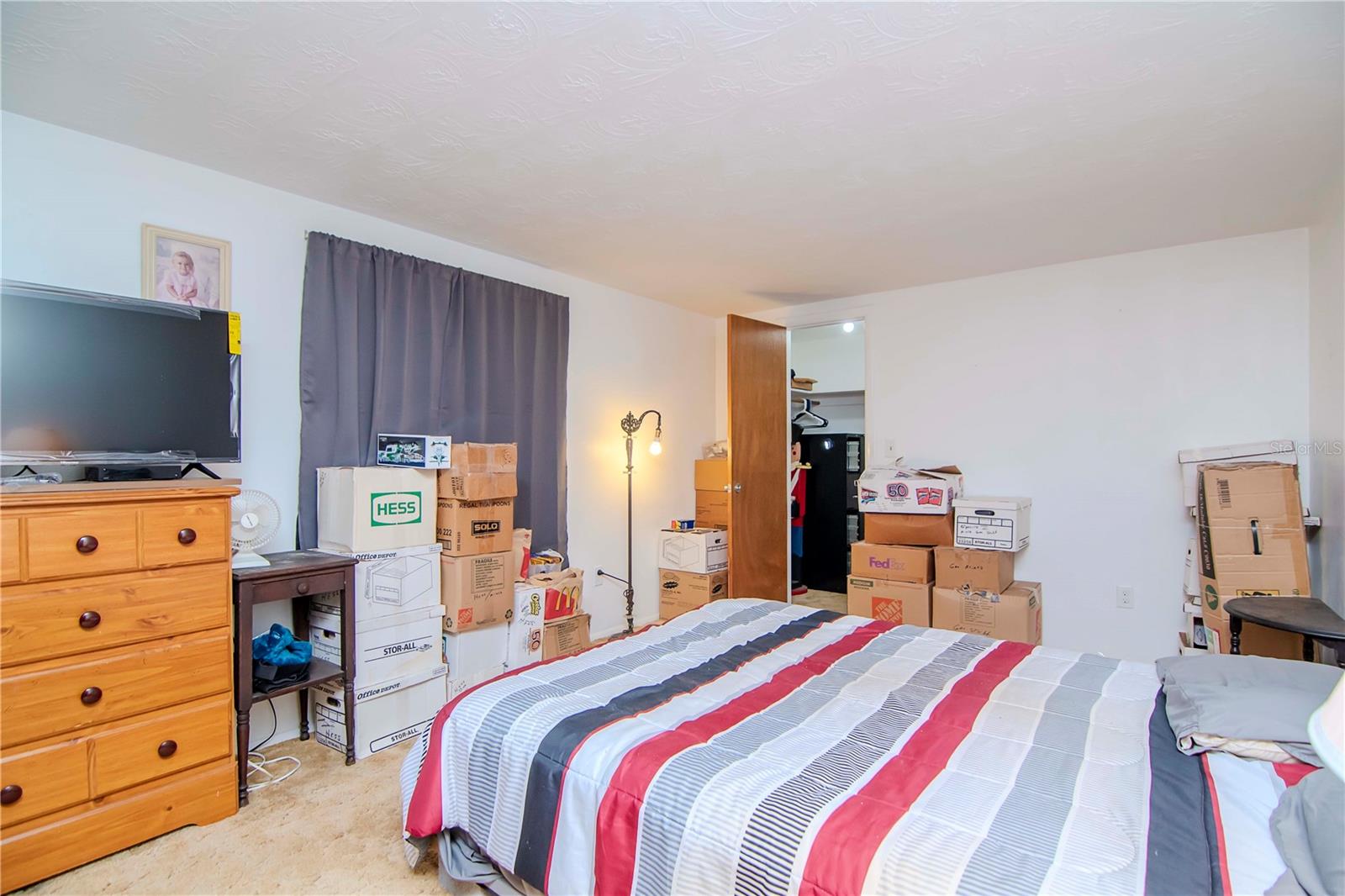 Large 2nd bedroom offers a sizable closet as well.
