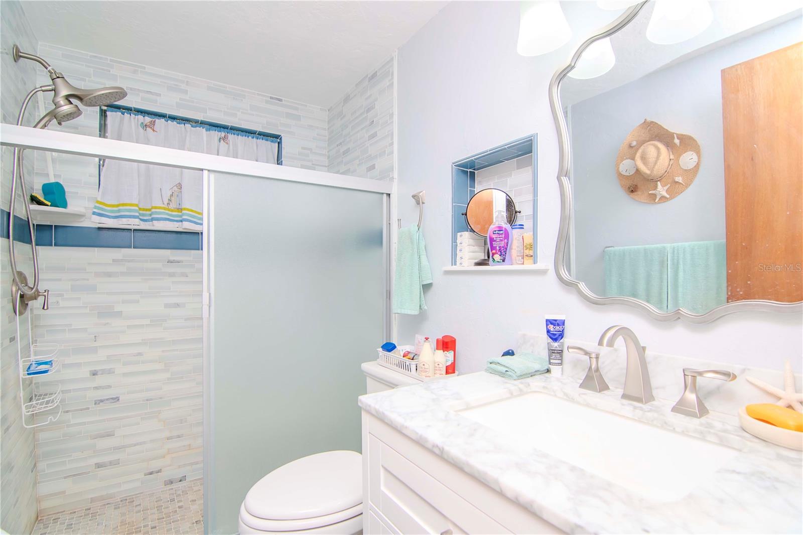 Master bath has been updated with beautiful coastal colors!