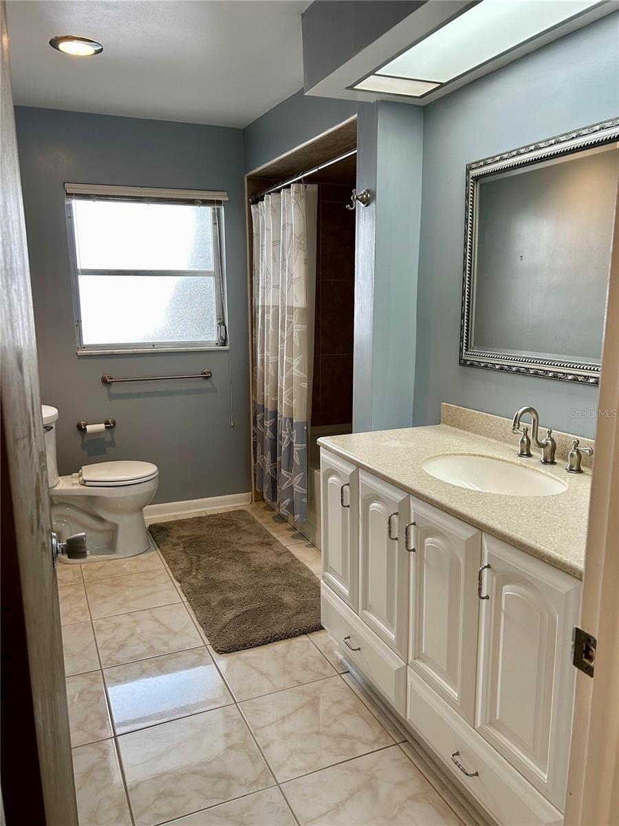 Guest bathroom; accessed from BR-2 and hall