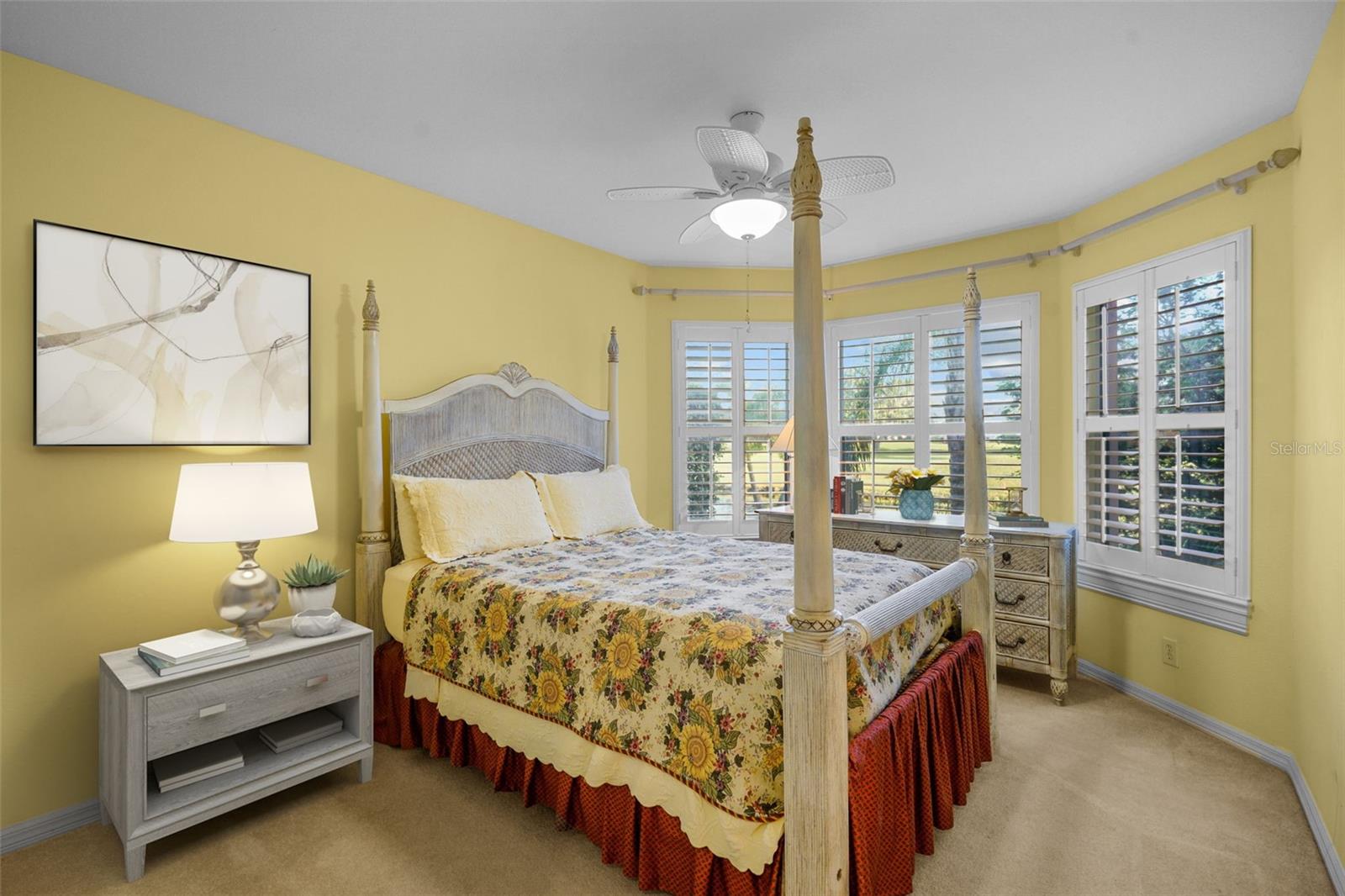 Bedroom 4 staged w/view of golf course and pond