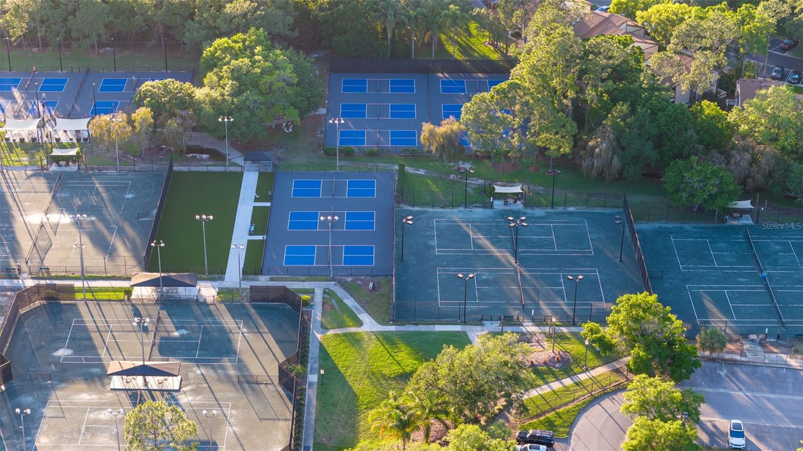 HOA Amenity -Aerial view of 12 clay tennis courts and 13 pickleball courts