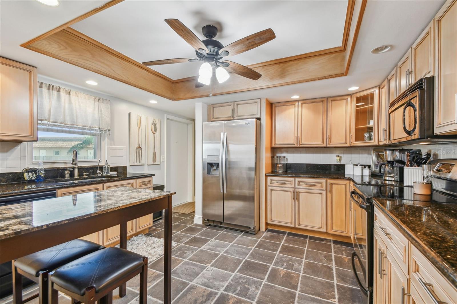 Kitchen with Maple cabinets and Granite counter tops