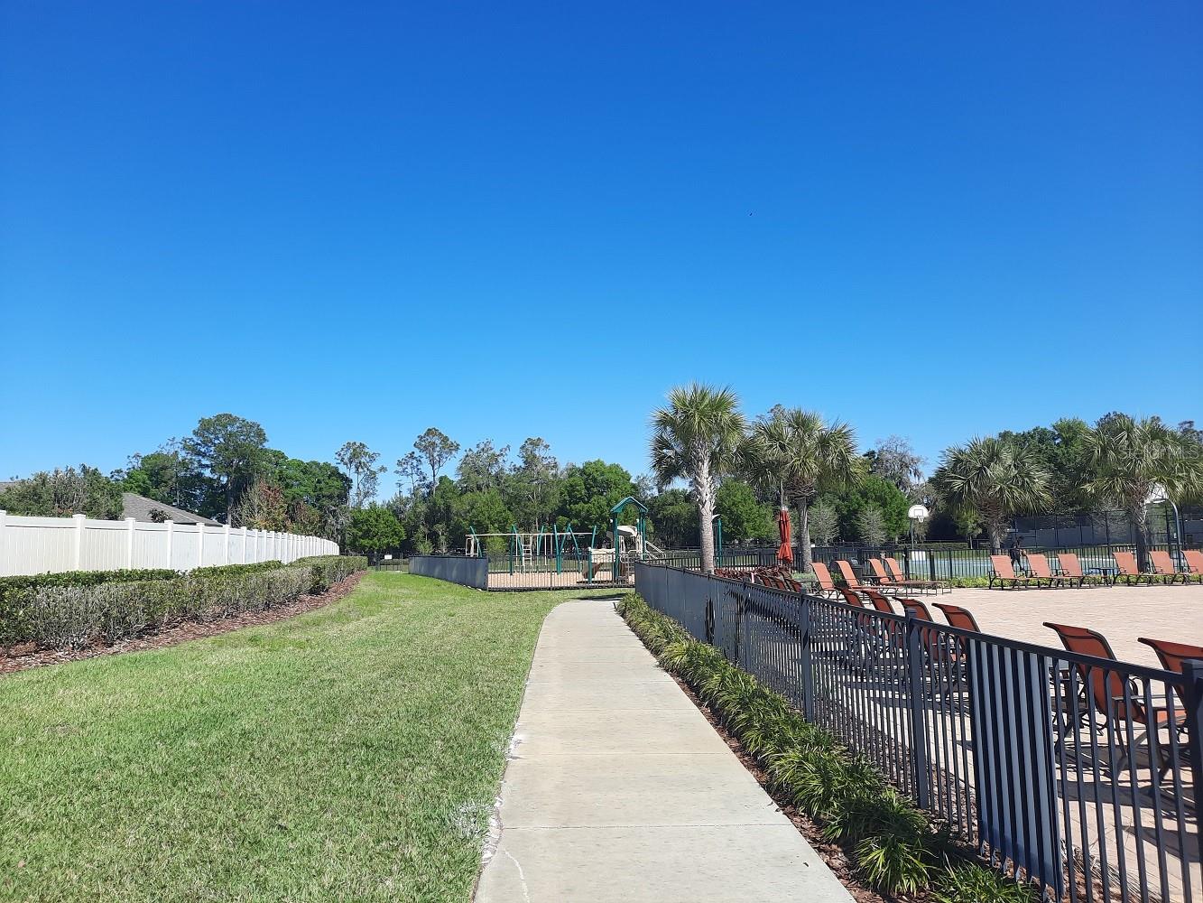 Gated Walkway to Playground, Basketball, & Tennis
