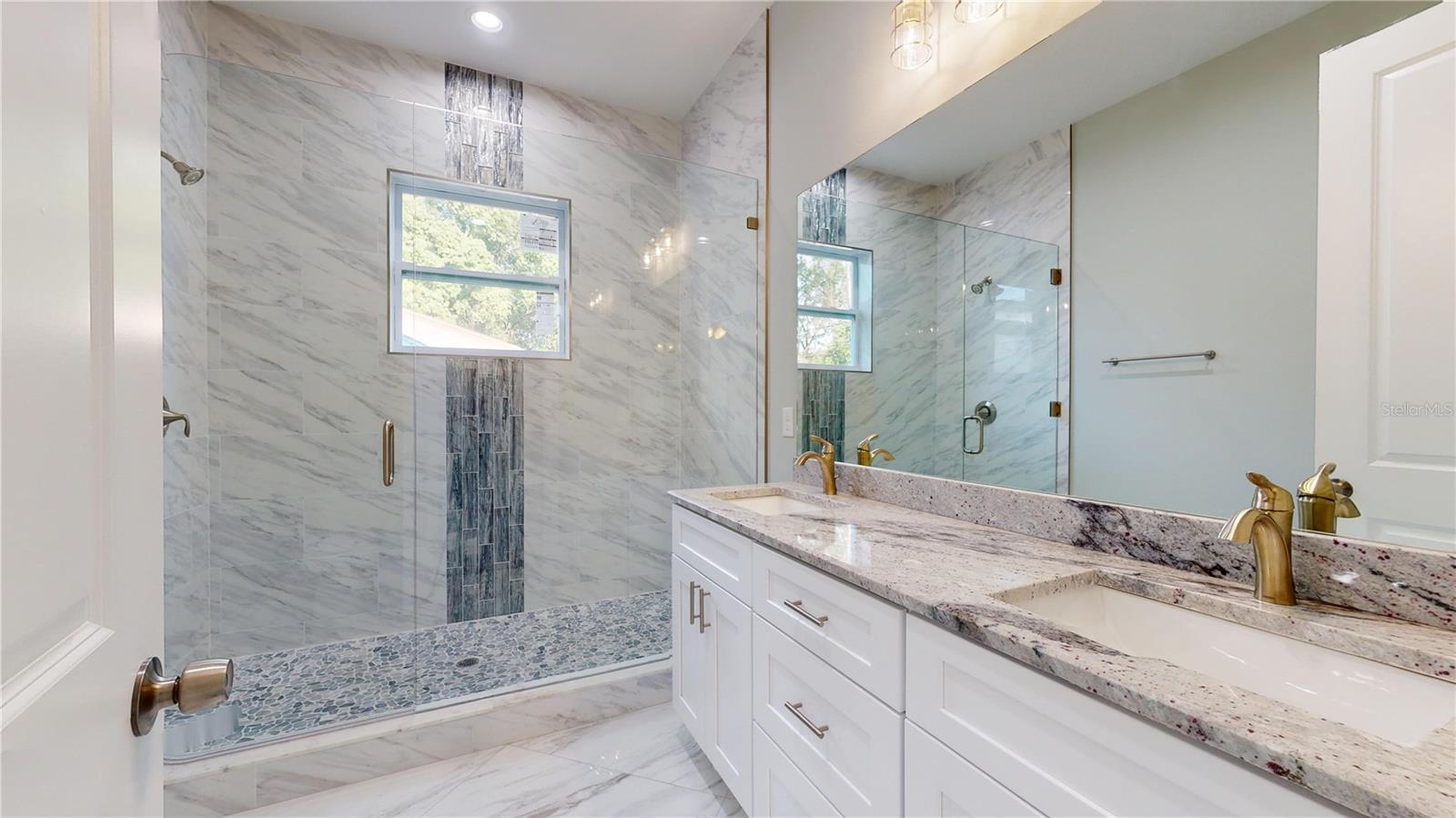 Ensuite Master Bath with Dual Sinks & Beautiful Tiled Walk-In Shower